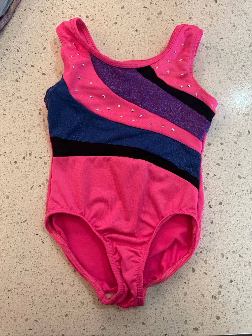 Girls' Bright Pink leotard with Purple Lining - Size 4/5